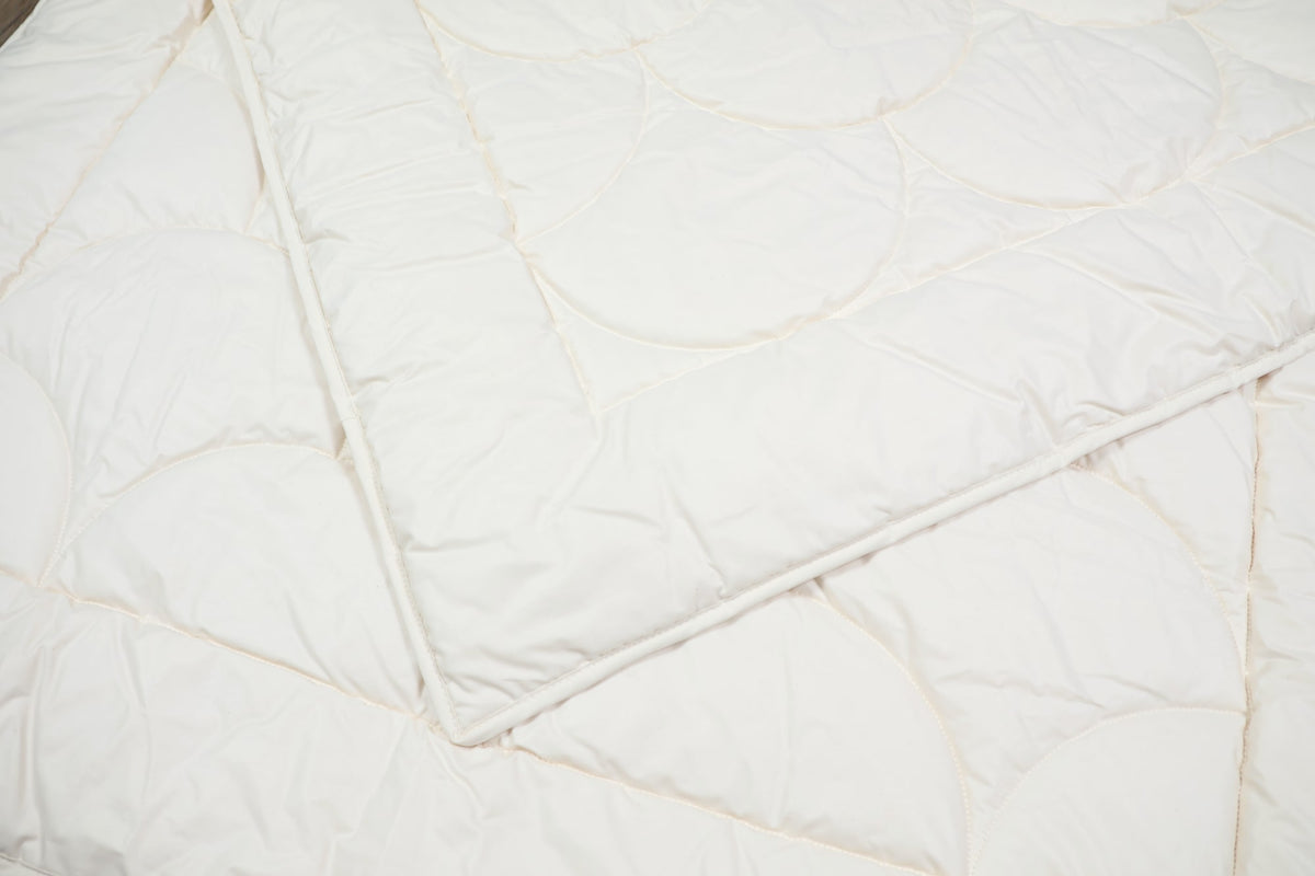 Steppbett aus 100% kbA Baumwolle – Bezug und Füllung in Bio-Qualität | KLEINER Naturbettwaren
