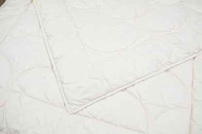 Steppbett aus 100% kbA Baumwolle – Bezug und Füllung in Bio-Qualität | KLEINER Naturbettwaren