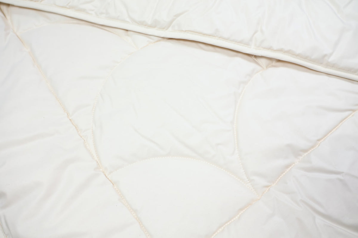 Steppbett aus 100% kbA Baumwolle – Bezug und Füllung in Bio-Qualität | KLEINER Naturbettwaren