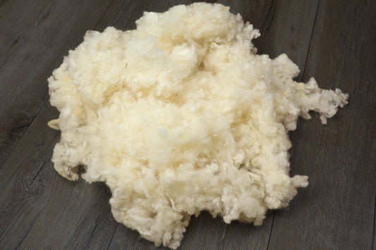 Kopfkissen-Füllung Wollflocken kbT aus eigener Herstellung, 1 kg – KLEINER Naturbettwaren